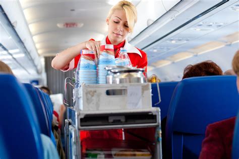 Flight attendant providing special assistance