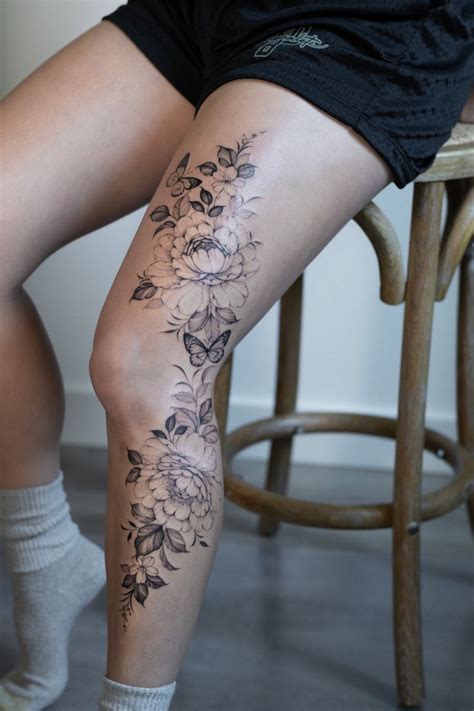 Description of floral leg tattoos