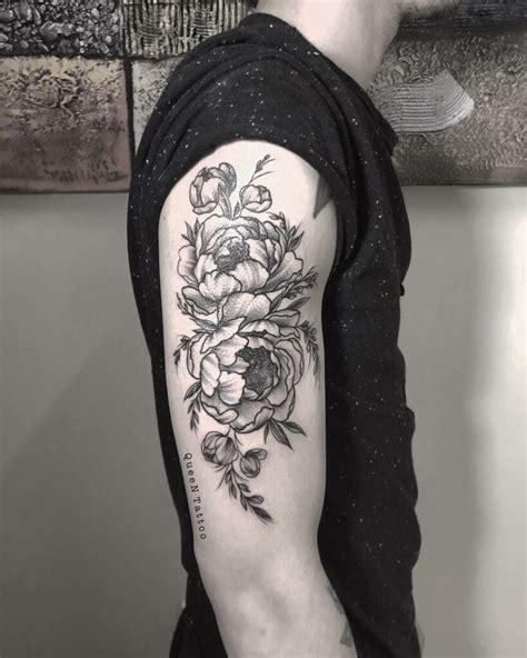 Floral tattoo ideas for men on the arm