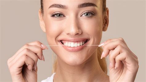 Flossing for bad breath