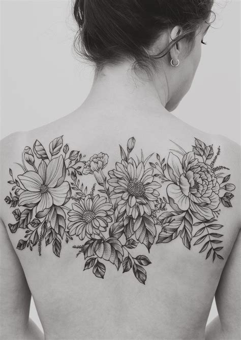 Flowers back tattoos for women