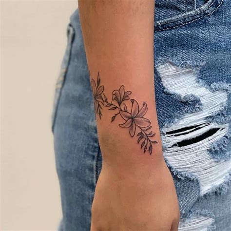 Flowers wrist tattoos for women