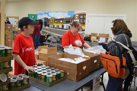 Food bank volunteers sorting donations