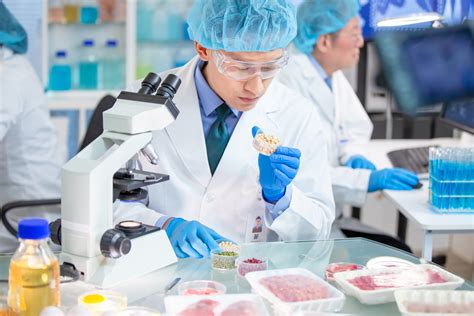 Food scientist testing food samples