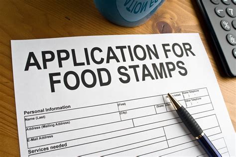 A caseworker conducting a food stamp interview