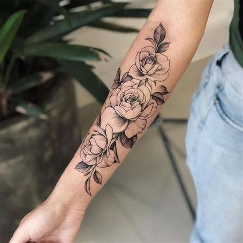 Forearm tattoo designs for women with flowers