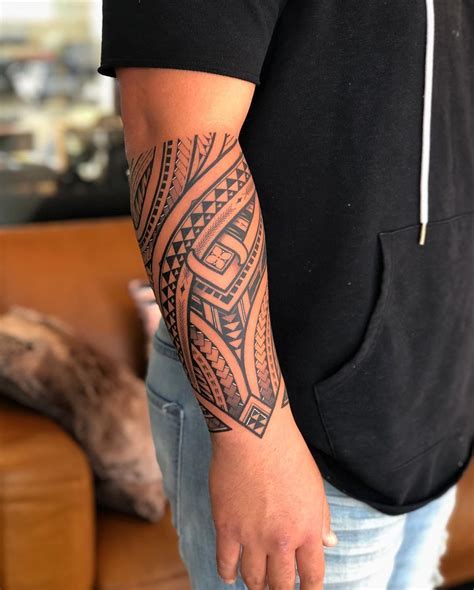 Forearm tattoo tribal patterns