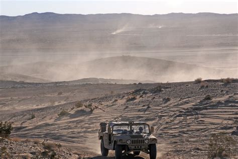 Soldiers training in a desert environment at Fort Irwin