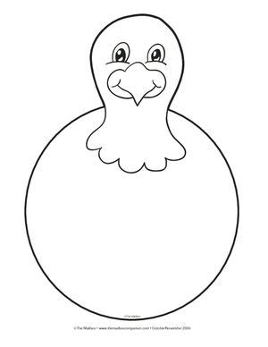 A child creating a story using a free printable turkey body template