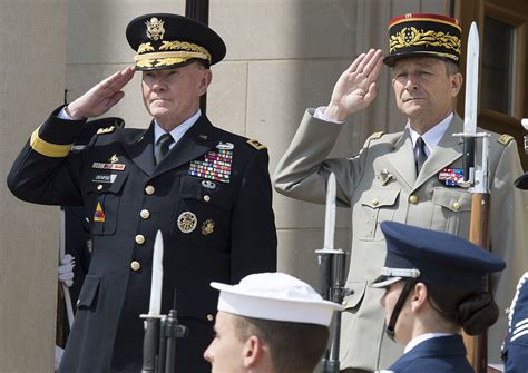 French Army soldiers rendering a salute