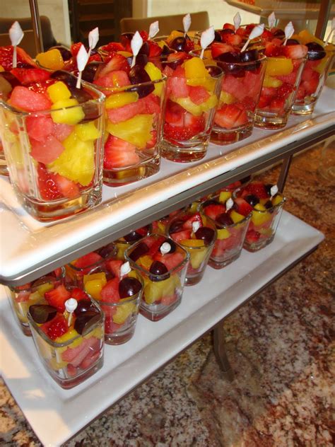 A fruit cup arrangement with a variety of fruits.