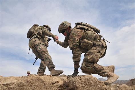 Full-time support soldier working at a desk