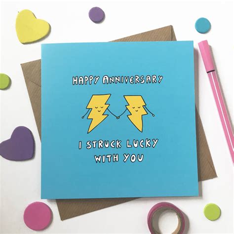 A funny anniversary card with a pun that says 'You're the mac to my cheese... the peanut butter to my jelly... the Merlot to my pizza'