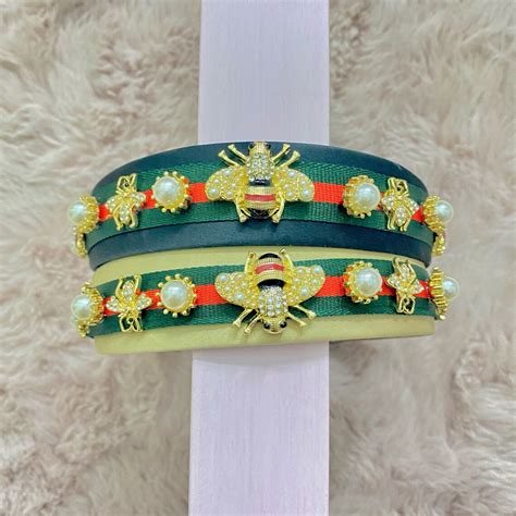 A person wearing a garden-inspired bee headband