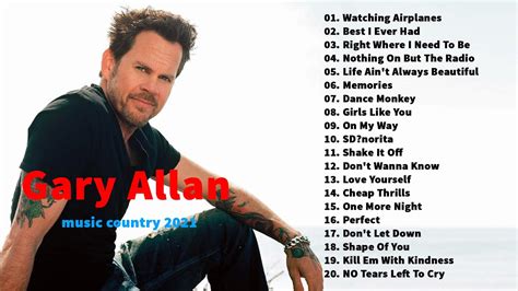 Gary Allan sitting in a plane, writing lyrics in a notebook