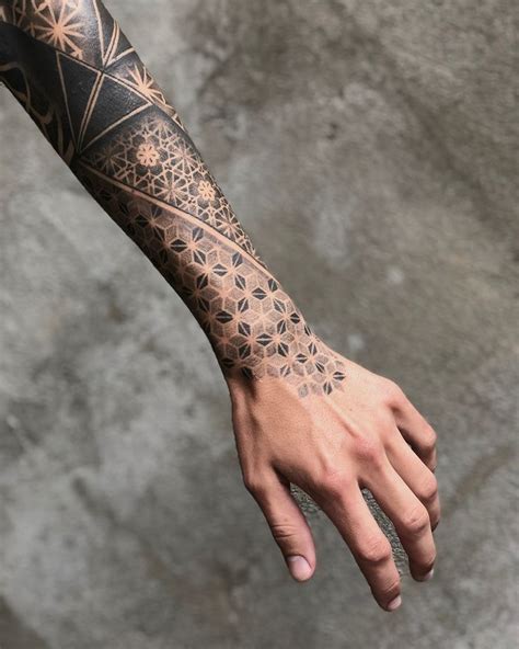 Description of Geometric Arm Sleeve Tattoo