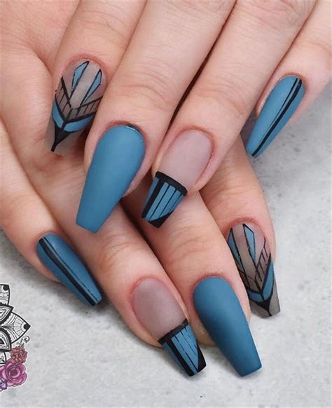 Geometric nail art design with bold shapes and patterns