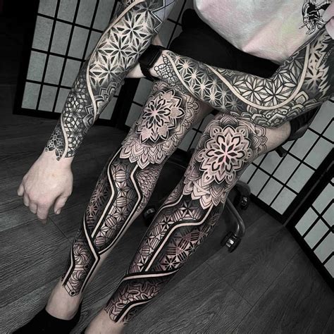 Geometric outer thigh tattoo designs