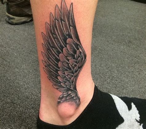 getting a 5 leg wing tattoo