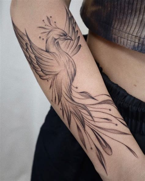 getting phoenix arm tattoo process