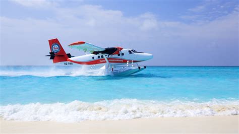 A person assembling a remote control seaplane