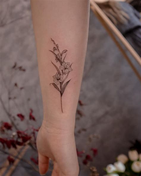 Gladiolus flower tattoo designs for women