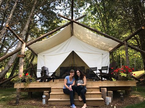 A person participating in an adventure activity in a glamping setting