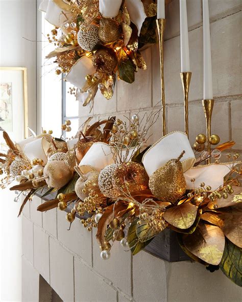 A selection of gold Christmas decorations featuring bows and ornaments