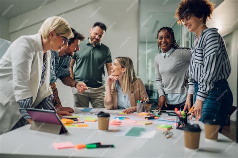 A group of people working together, indicating a sense of collaboration and teamwork