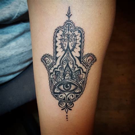 Hamsa symbol tattoo for protection