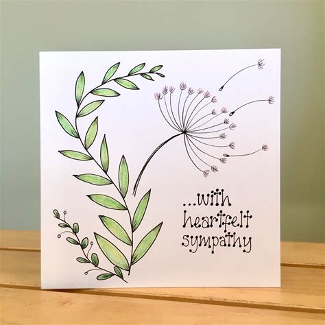 A hand-drawn sympathy card with a watercolor design