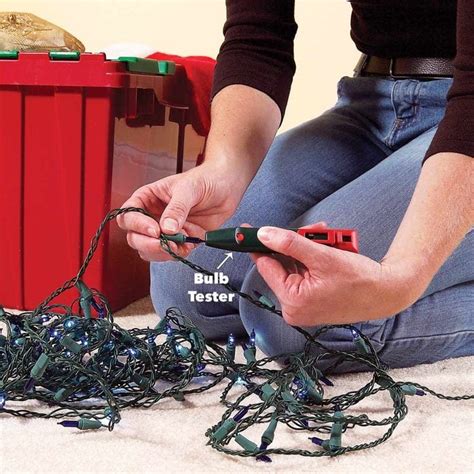 A handyman working on a Christmas light repair