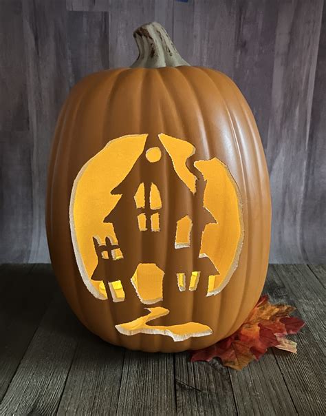 Haunted house pumpkin carving