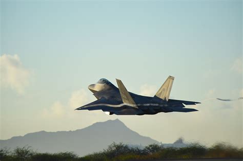 F-22 Raptor aircraft taking off from Joint Base Pearl Harbor-Hickam