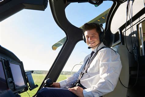 A commercial helicopter pilot in a helicopter