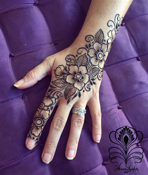 Floral henna hand design