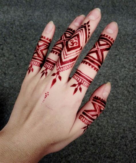 Geometric henna hand design