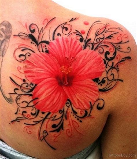 A colorful hibiscus tattoo design on the back