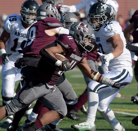 High school football players in action