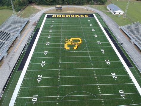 High school football players with their families and friends