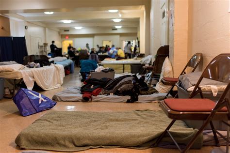 Homeless shelter staff assisting individuals with food stamps