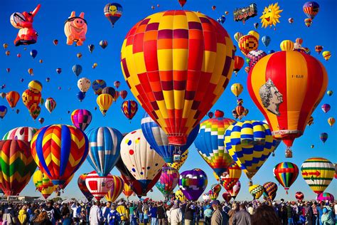 A hot air balloon soaring above a map of the world