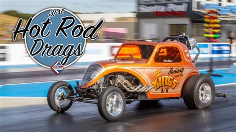 A hot rod racing down the track