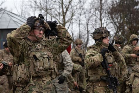 Infantrymen mentoring junior soldiers