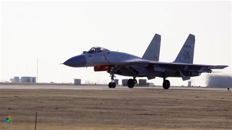 J-15t Carrier Fighter Jet taking off from an aircraft carrier