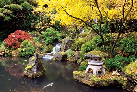 A serene Japanese garden with stone lanterns and trees