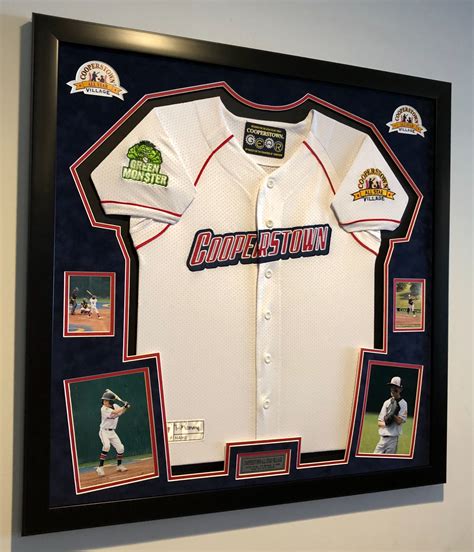 A jersey display baseball card frame template with a fabric background and stitching