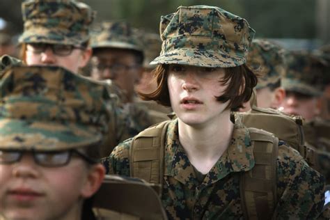 A group of Marine recruits standing at attention