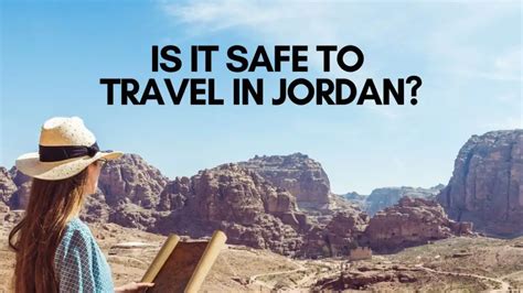 Tourists in Petra, Jordan, with a police officer in the background