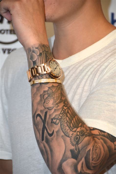 Justin Bieber's arm tattoos ideas